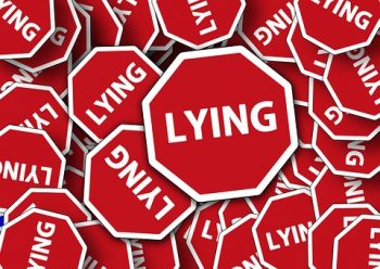 bunch of signs that say Lying